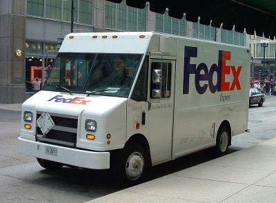 A typical FedEx delivery truck. Photograph taken in Chicago, Illinois on August 26, 2005 by Kelly Martin.